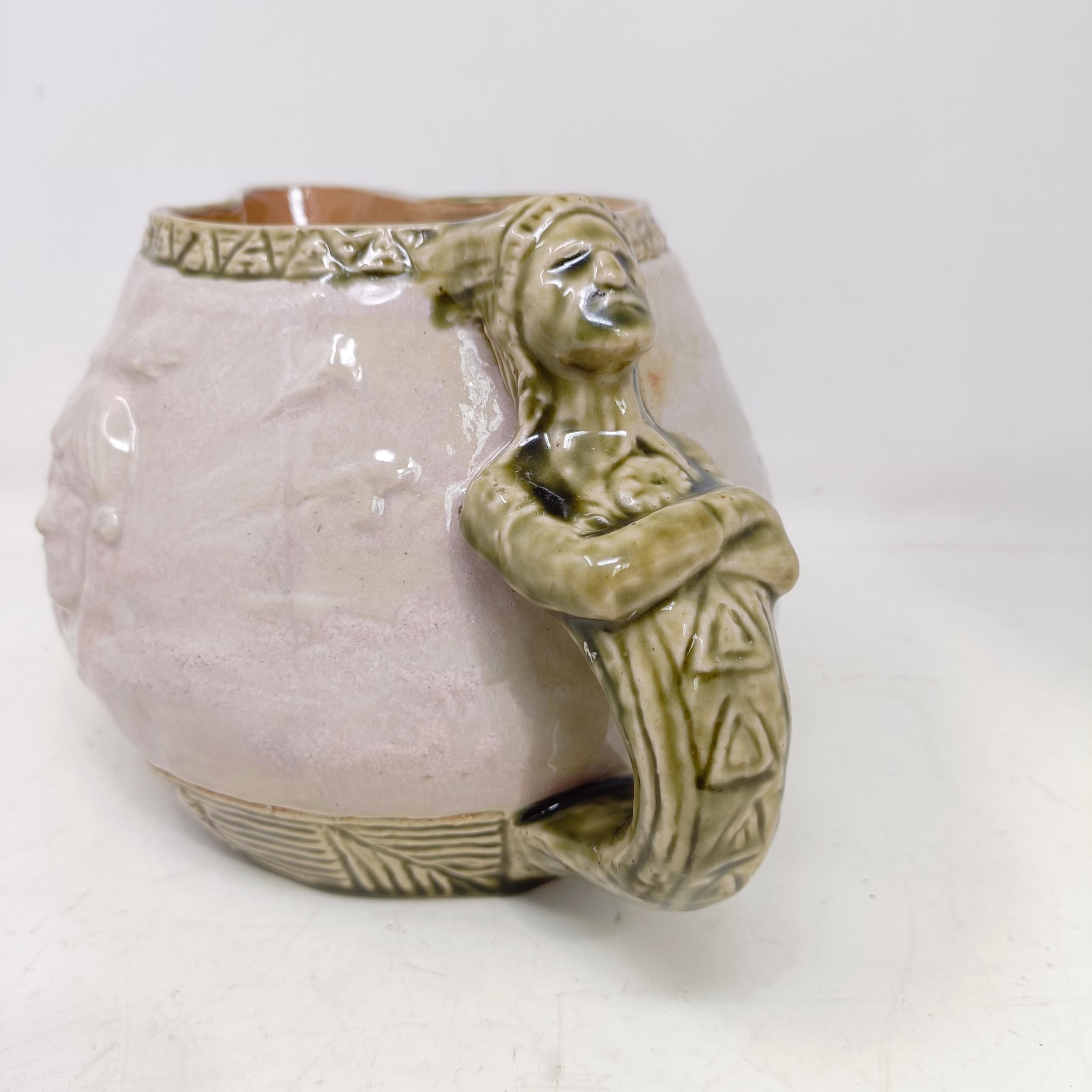 A Doulton Lambeth jug, by Edward Kemeys, decorated with native American Indians, 13 cm high - Image 2 of 9