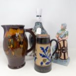 A Royal Doulton jug, decorated golfers, 23 cm high, a Doulton Lambeth jug, decorated flowers, with a