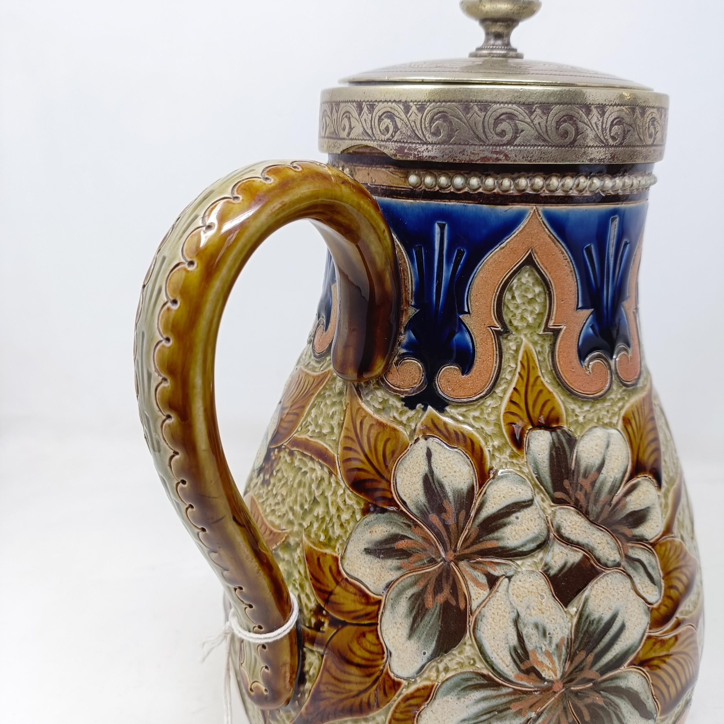 A Doulton Lambeth jug, by Elizabeth M Small, decorated flowers, with a silver plated mount and - Image 2 of 12