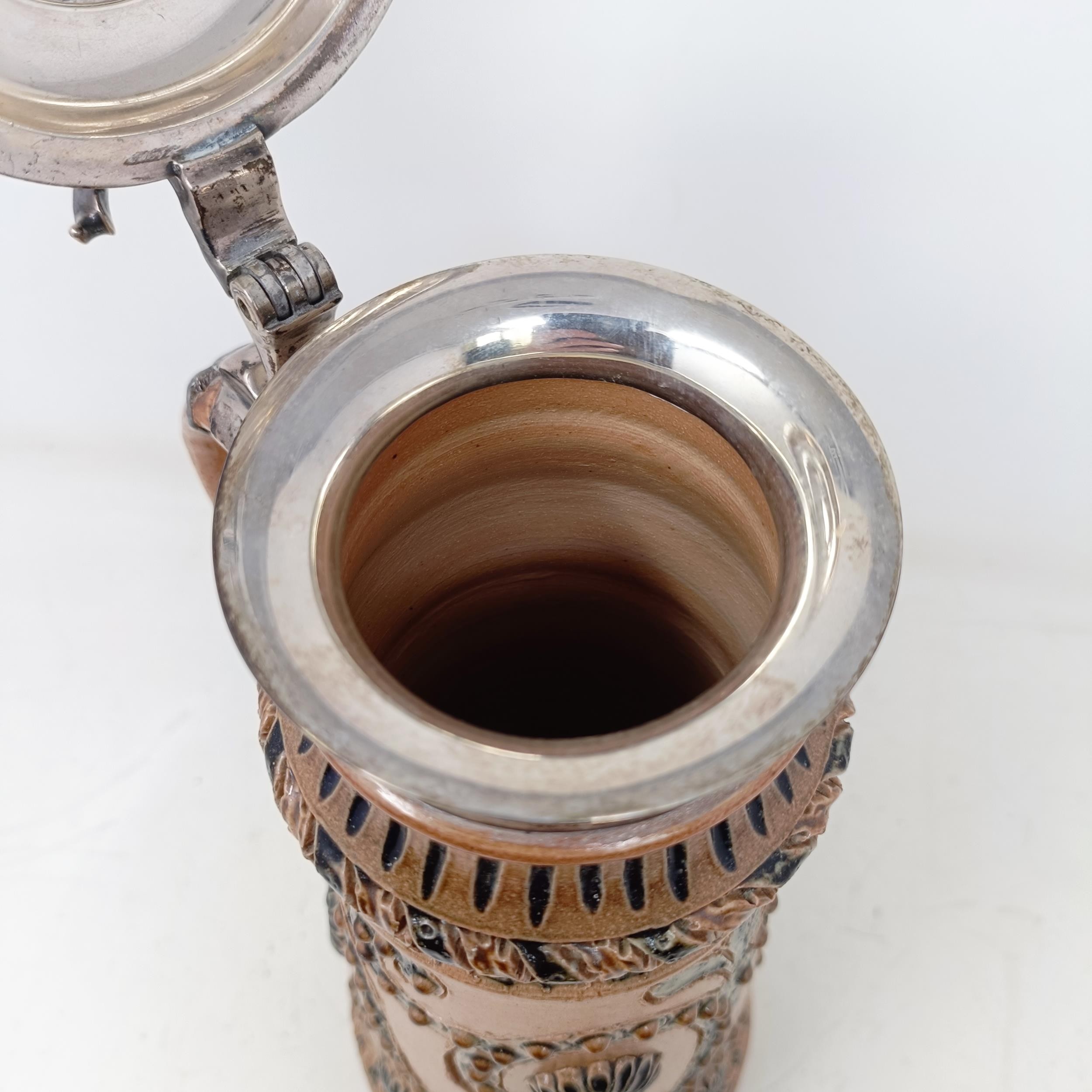 A Doulton Lambeth stoneware flagon, with a silver mount, London 1866, 30 cm high Handle crudely - Bild 8 aus 10