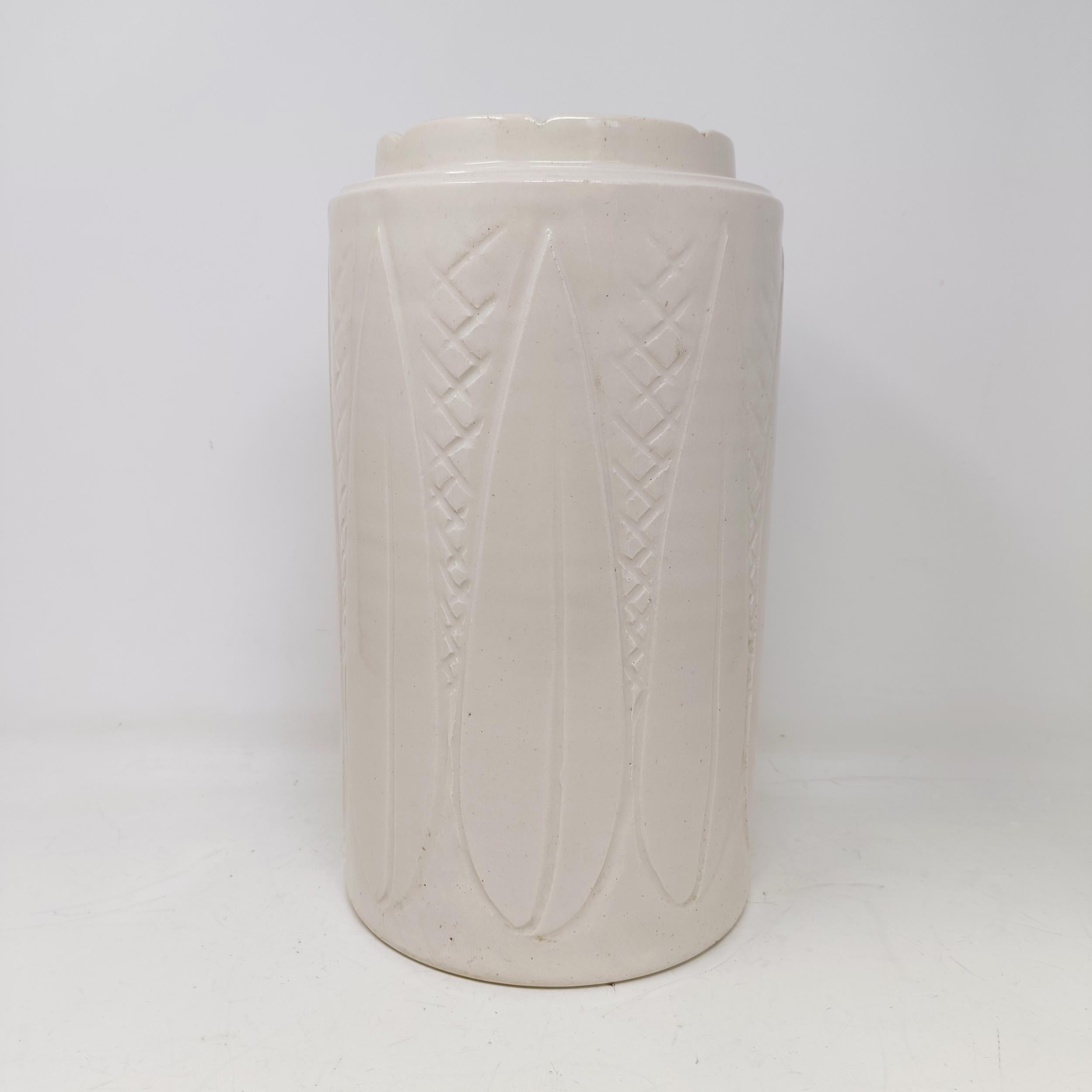 A Royal Doulton vase, with incised decoration, 31 cm high