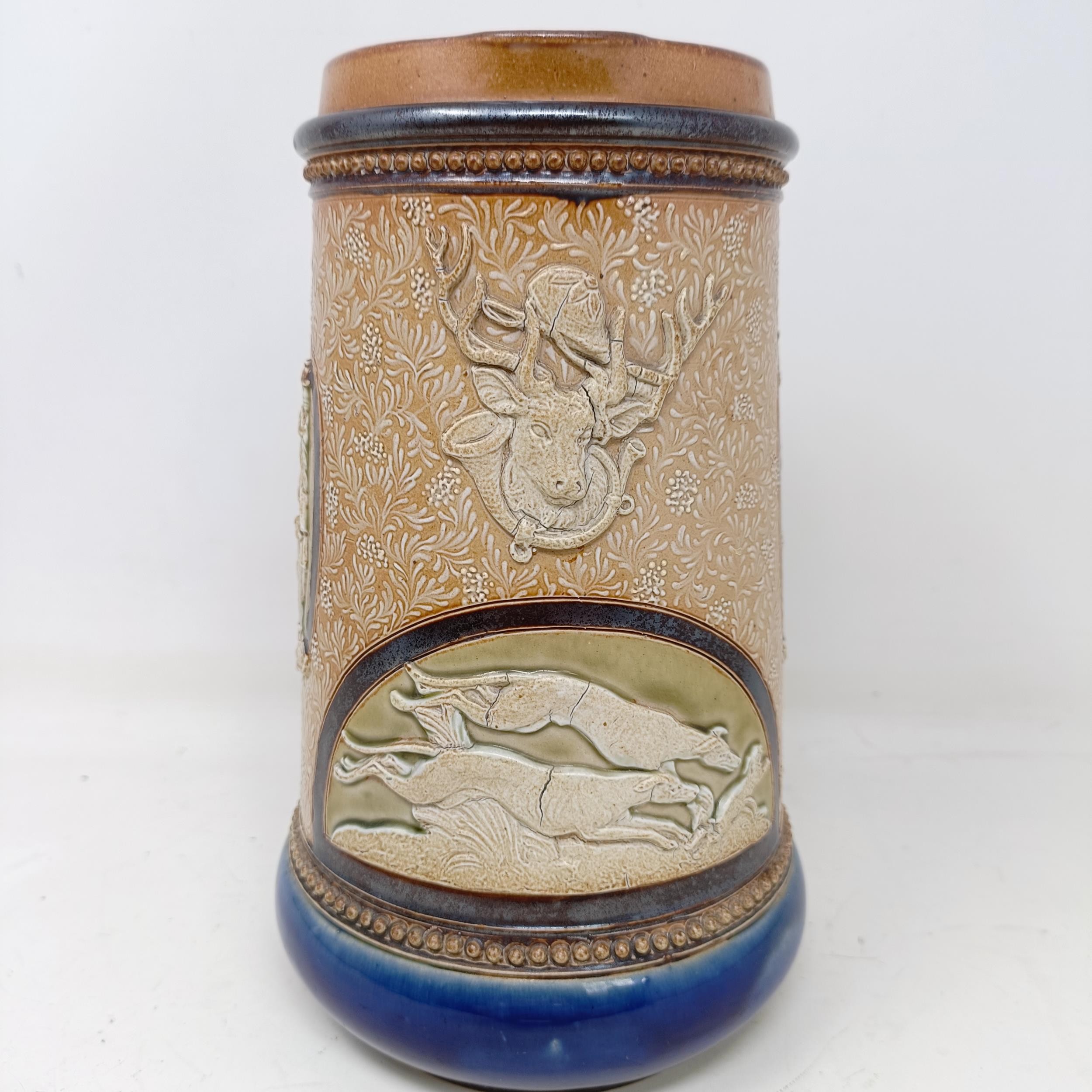 A Doulton Lambeth jug, by Harriet Hibbut, decorated hunting scenes, 22 cm high No chips, cracks or - Image 2 of 7