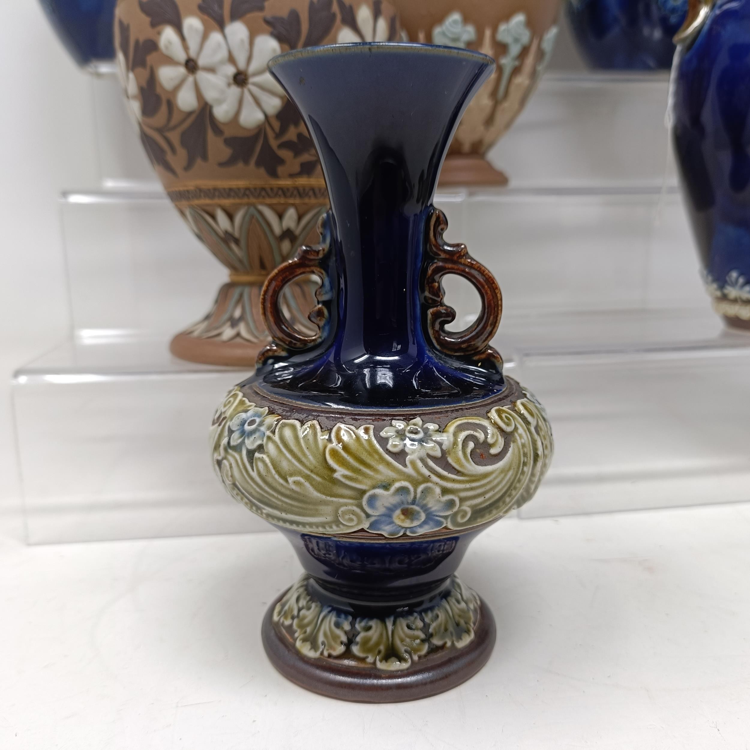 A Doulton vase, decorated flowers, 23 cm high, a Doulton Lambeth spirit flask, by Bessie Newberry, - Image 15 of 43