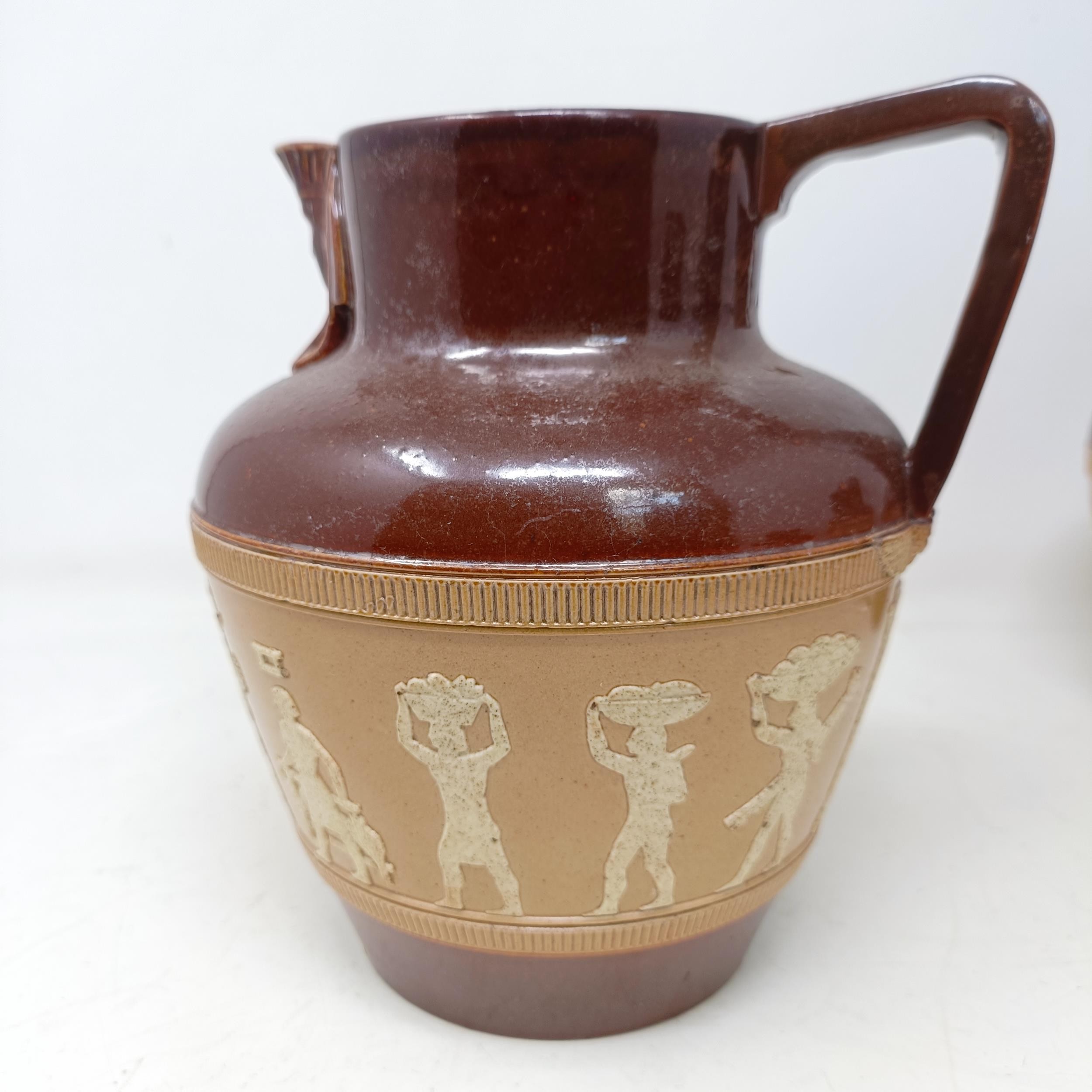 A graduated set of Doulton Lambeth jugs, 20 cm, 18 cm and 14 cm, and another similar, 18 cm (4) - Image 22 of 25
