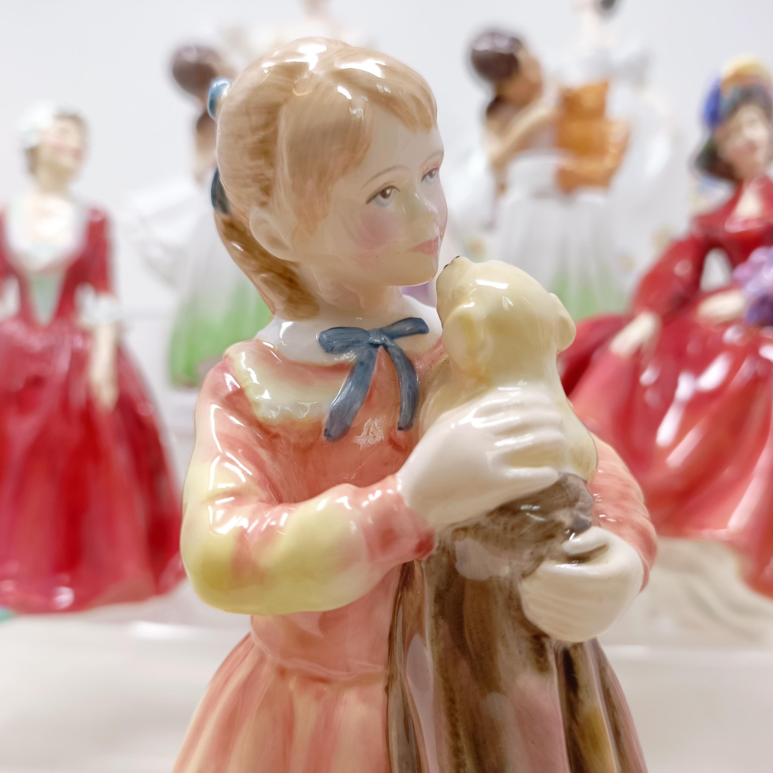 A Royal Doulton figure, Gwynneth Lilac Time HN2137, Faith HN3082, Winter Welcome HN3611, And One For - Image 9 of 30