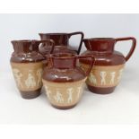 A graduated set of Doulton Lambeth jugs, 20 cm, 18 cm and 14 cm, and another similar, 18 cm (4)