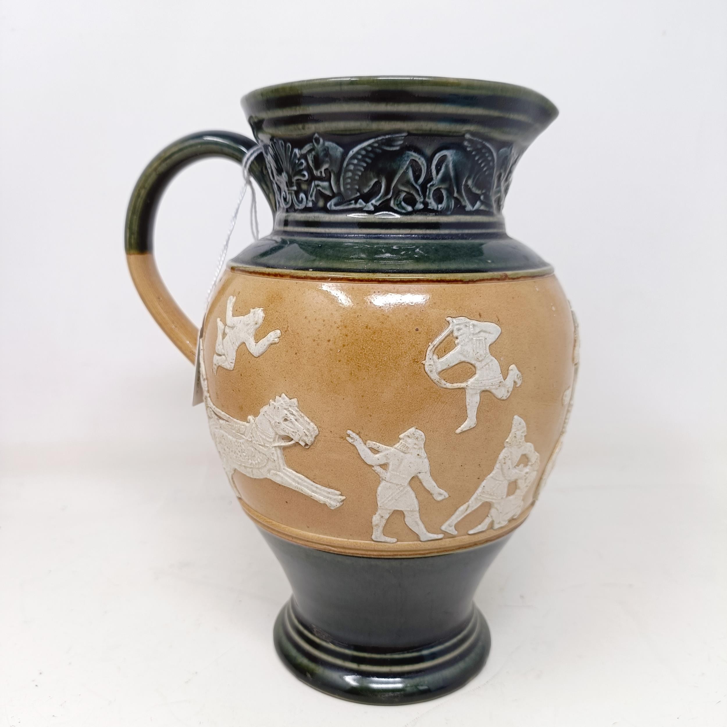 A Doulton Lambeth jug, decorated in Egyptian manner, 20 cm A few rough areas to the touch to the - Image 2 of 8