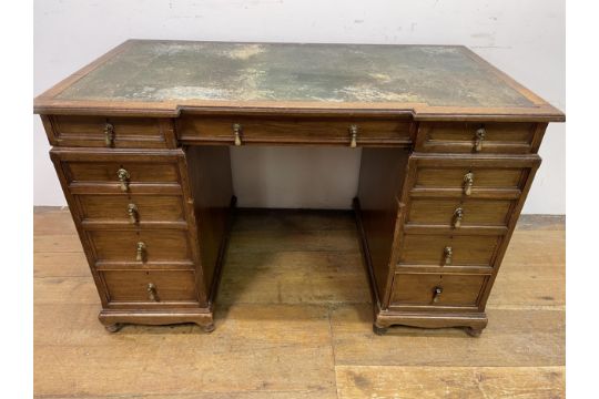 A mahogany pedestal desk, having a nine drawers, stamped Howard & Son, 125 cm In need of restoration - Image 1 of 7