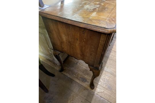 A walnut dresser base, having five drawers, on carved cabriole legs, 136 cm wide - Image 6 of 9