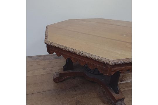 A Victorian carved oak octagonal library table, on a carved column support to a shaped base, 140 - Image 2 of 9