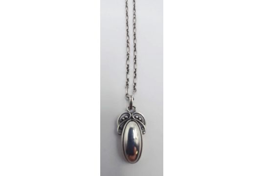 A Georg Jensen silver pendant, on a chain, 11.7 g Marks clear, some light surface wear, clasp - Image 1 of 4