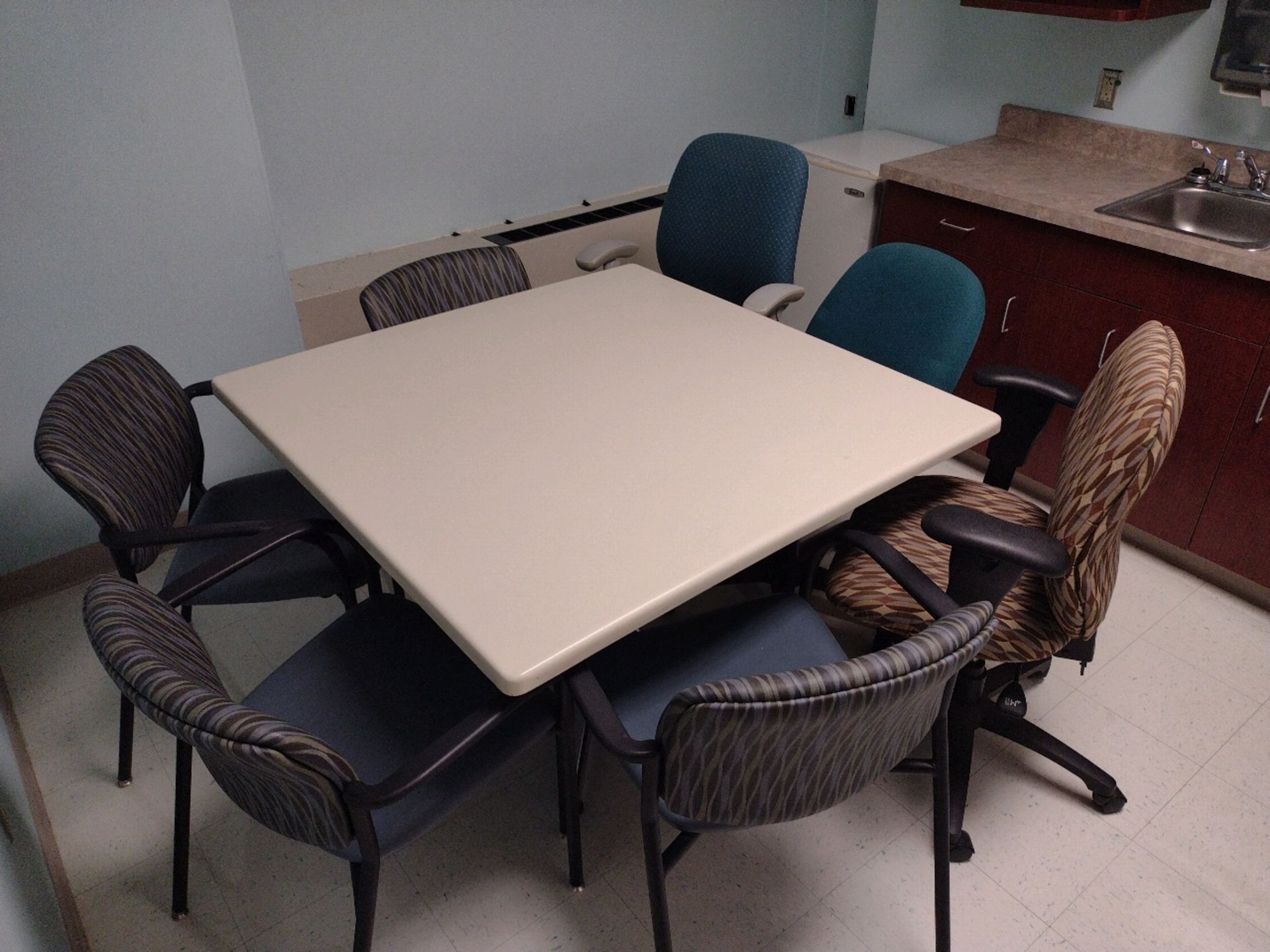 BREAK ROOM TO INCLUDE: REFRIGERATOR, MINI-REFRIGERATOR, TABLE AND CHAIRS (ICE MACHINE NOT INCLUDED)