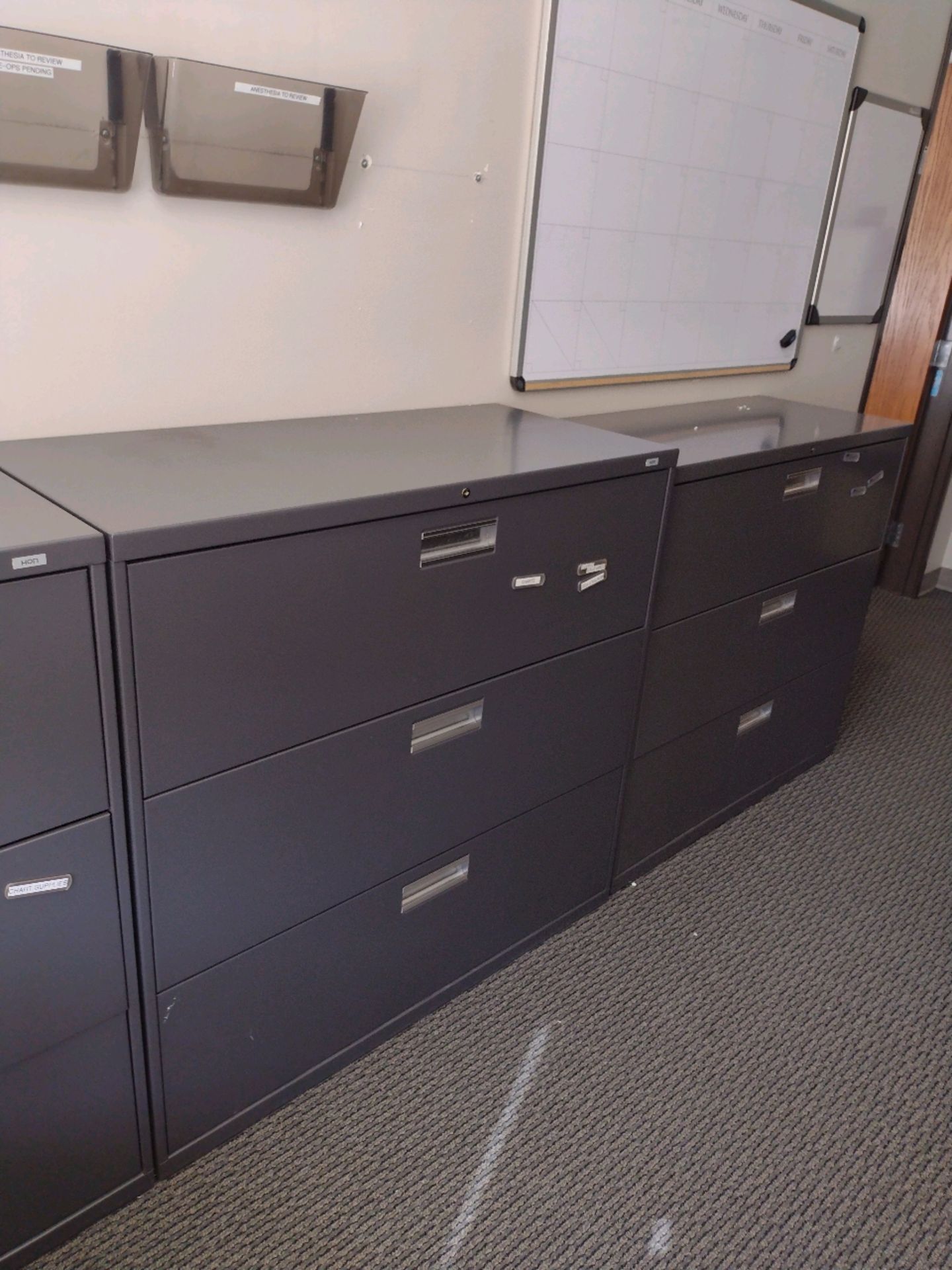 OFFICE TO INCLUDE: QTY. (2) DESKS WITH OVERHEAD STORAGE, CHAIRS, QTY. (4) FILE CABINETS, BULLETIN - Image 6 of 8