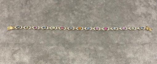 A very pretty bracelet with citrines, topaz and small diamonds, 9 carat gold 8.25 grams