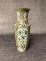 An antique Chinese famille rose vase 25 cm high