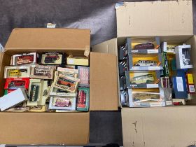 2 boxes of model buses and cars