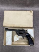 A WW2 Webley pistol ( jammed trigger)