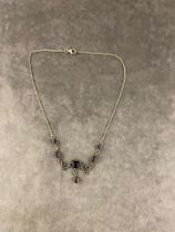 A vintage silver necklace with Amethyst pendants