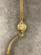 A 14 carat gold ladies watch