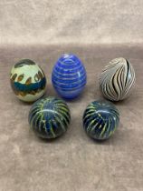 A group of 5 Murano paperweights