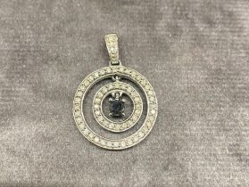 A 14 carat gold and diamond pendant with central sapphire 4.1g £100-£150