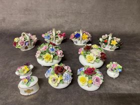 A group of royal Doulton flower baskets along with four seasons flower baskets by royal Stratford