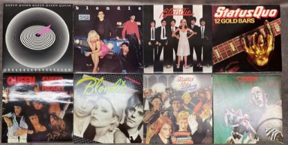 A collection of albums by Queen, Blondie and Status Quo, all in very good condition Click on the