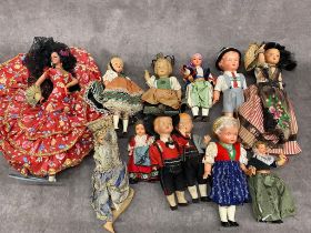 A collection of 12 vintage dolls