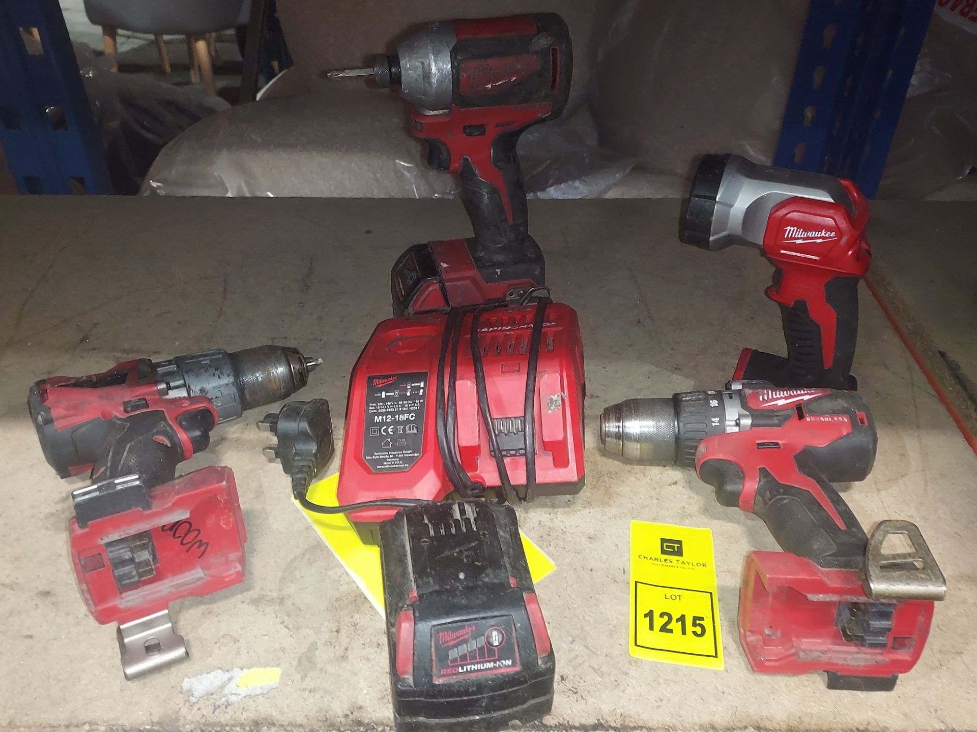 Millwakee Rake 7 PIECE MILLWAKEE TOOL LOT CONTAINING 3 DRILL'S , 1 TORCH TWO BATTERIES ...