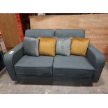 2 SEATER SOFA IN FABRIC BLUE ( NOTE CAME WITH NO LEGS BUT WE HAVE FIXED TEMPORARY USED LEGS /