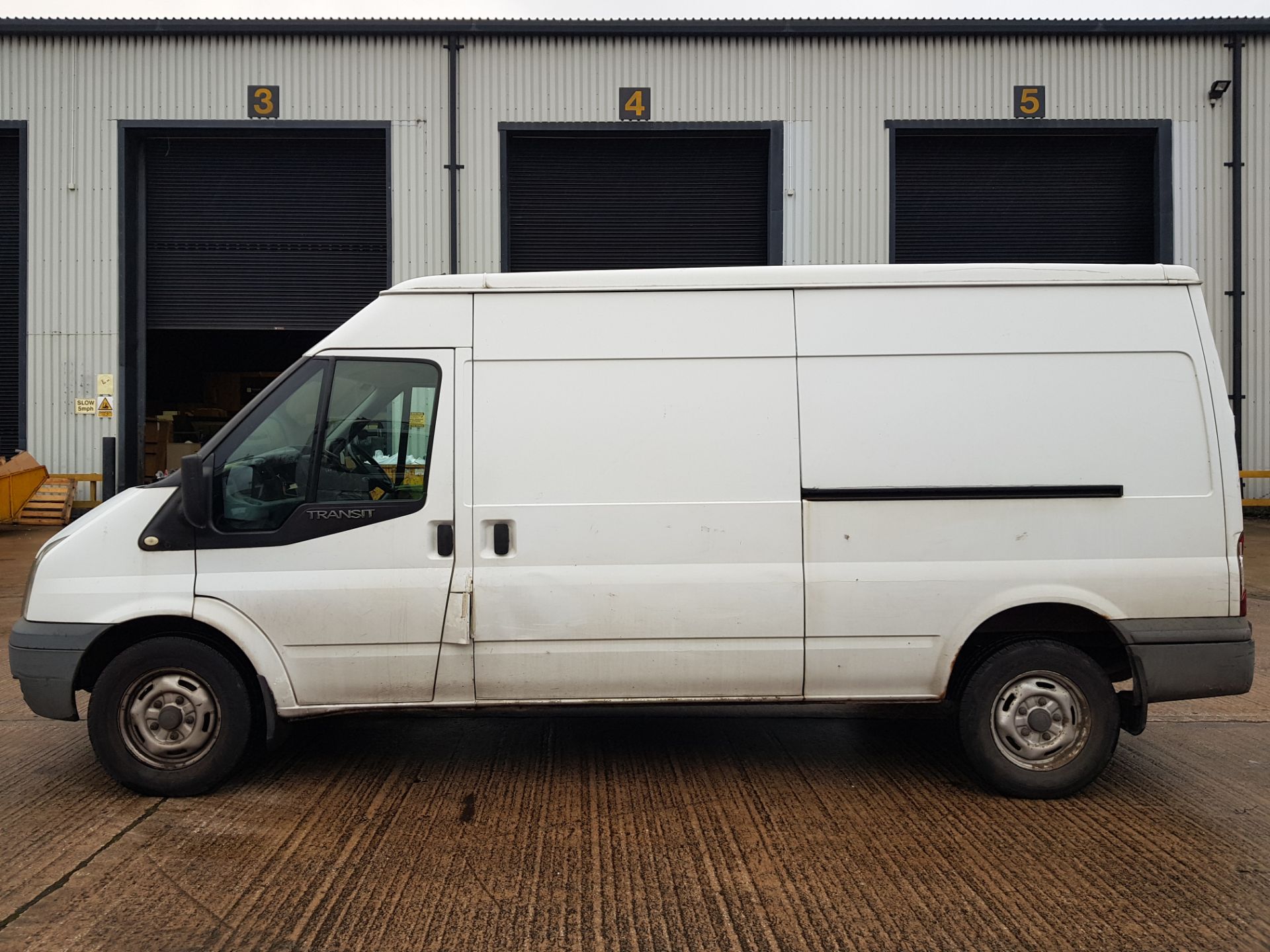 WHITE FORD TRANSIT 100 T350L RWD DIESEL PANEL VAN 2402CC FIRST REGISTERED 29/12/2009 REG: MW59HGM - Image 6 of 11