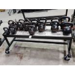 1 X 1 TIER KETTLE BELL RACK ON WHEELS WITH 19 VARIOUS WEIGHTED KETTLE BELLS TO INCLUDE 1 X 2 KG /