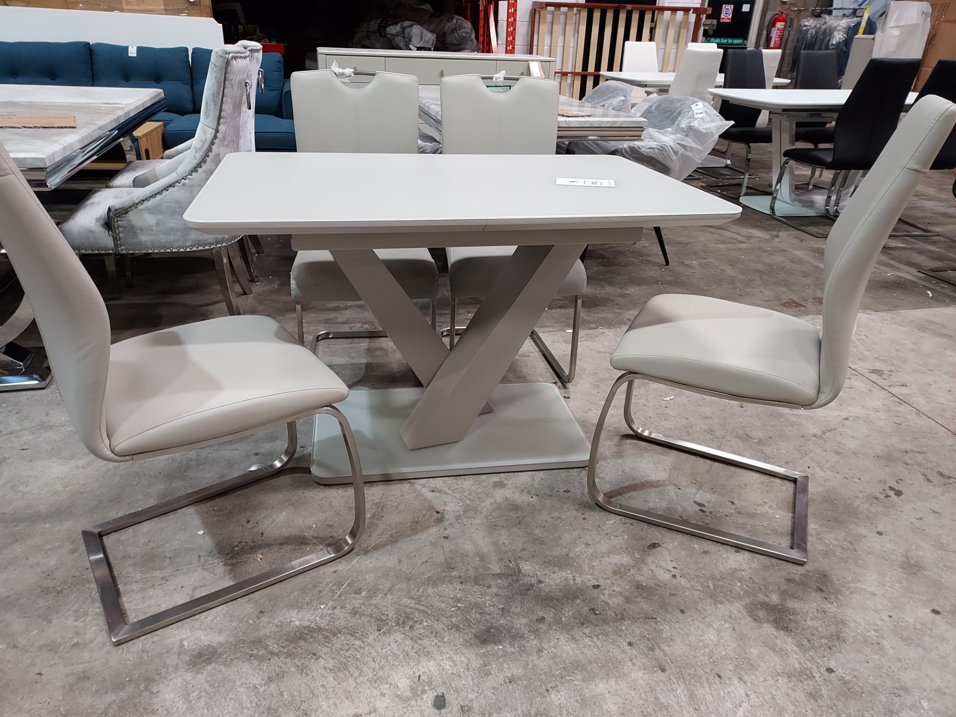 1 X RAFFAEL GLASS TOP EXTENDABLE DINING TABLE - IN LIGHT GREY WITH 4 X LAZZARO LEATHER LOOK LIGHT