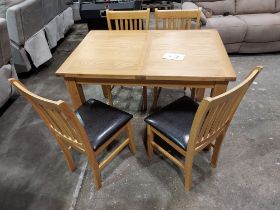 1 X BRAND NEW WOODEN OAK EXTENDABLE DINING TABLE WITH 4 WOODEN OAK AND BLACK LEATHER LOOK DINING