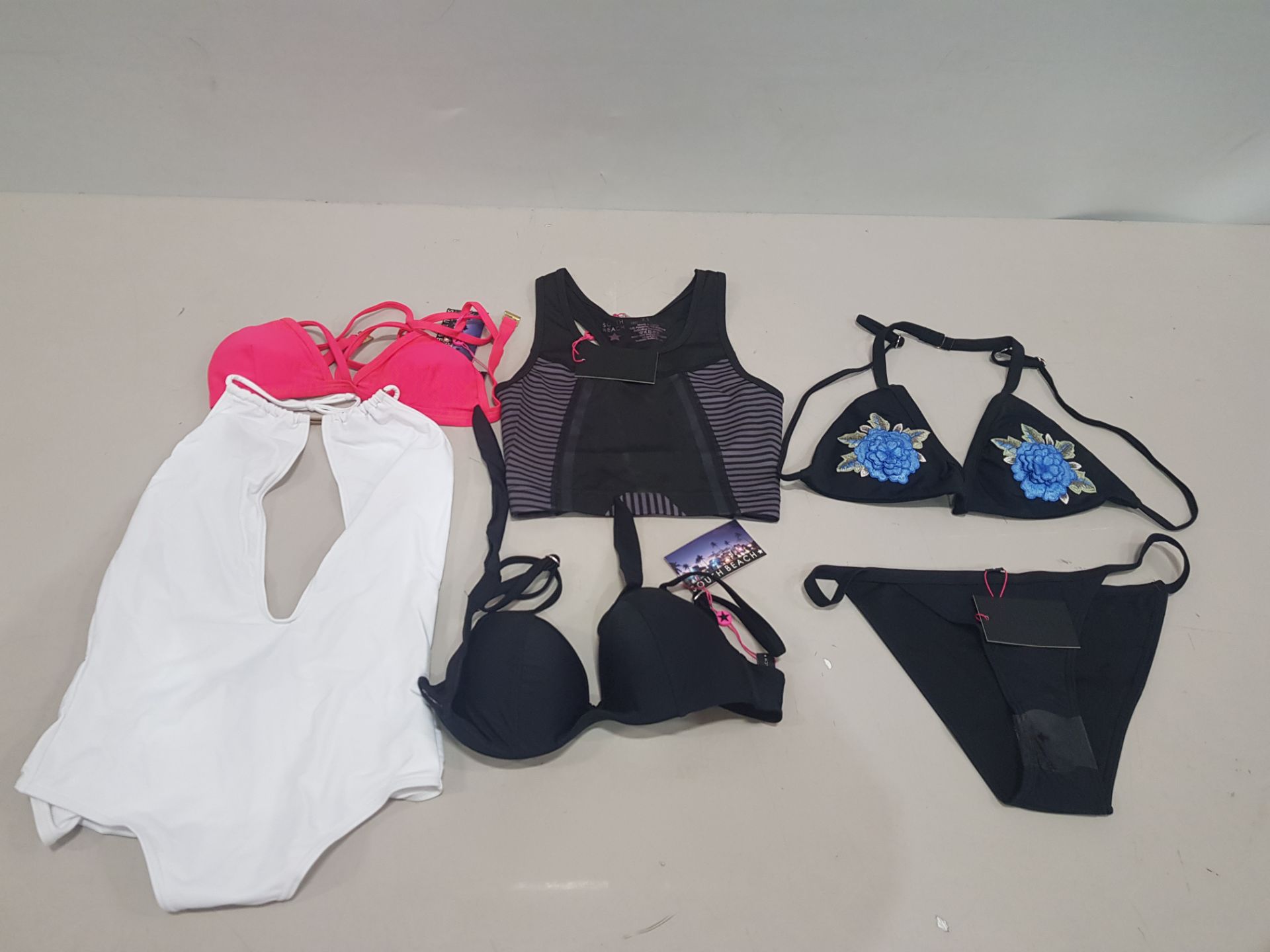 200 X BRAND NEW MIXED CLOTHING LOT CONTAINING SOUTH BEACH VICKY NEON PINK PADDED BIKINI TOPS / SOUTH