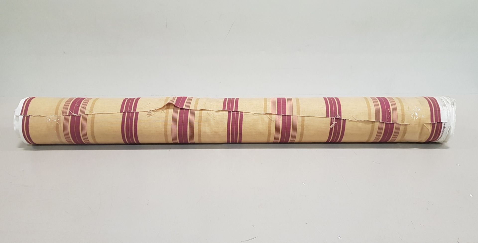 1 X ROLL OF FABRIC IN BROWN AND RED LINED DESIGN - THE LENGTH 43M - £12.99 / M - TOTAL £558.57
