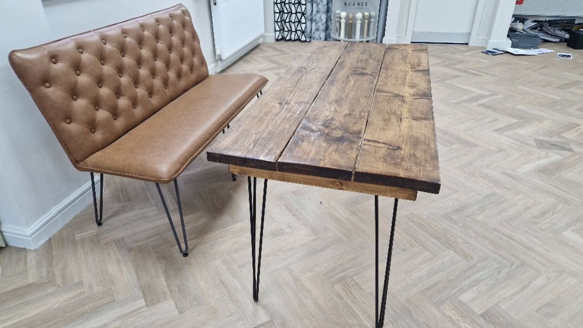 A CONTEMPORARY INDUSTRIAL STYLE DINING TABLE WITH HAIRPIN LEGS IN DARK WOOD WITH BOTTOMBACK