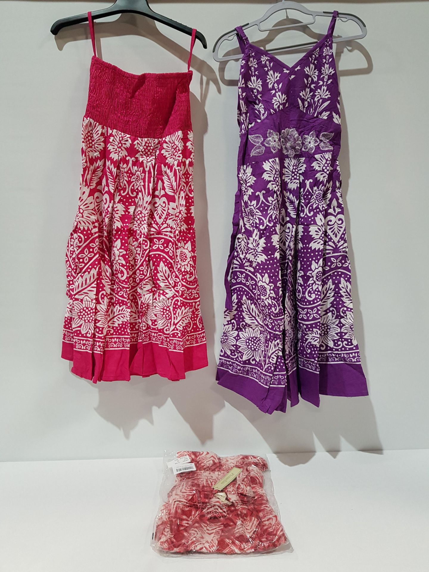 24 X BRAND NEW SUMMER PISTACHIO DRESSES/ SKIRTS IN RED , PURPLE AND PINK SIZES INCLUDE MIXED SMALL