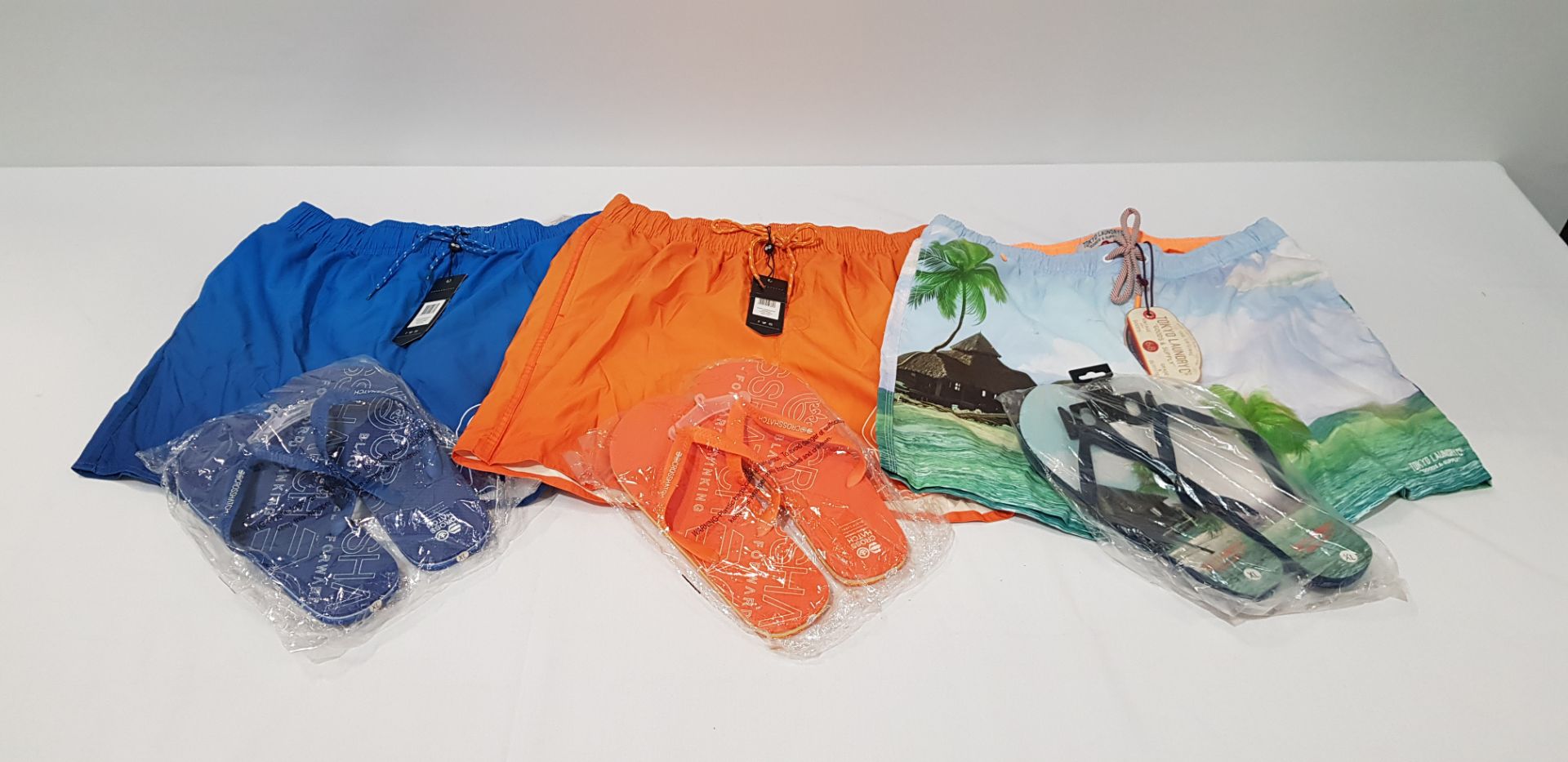 12 X BRAND NEW MIXED LOT CONTAINING 7 MIXED SWIMMING SHORTS IN MIXED SIZES AND STYLES, 5 MIXED