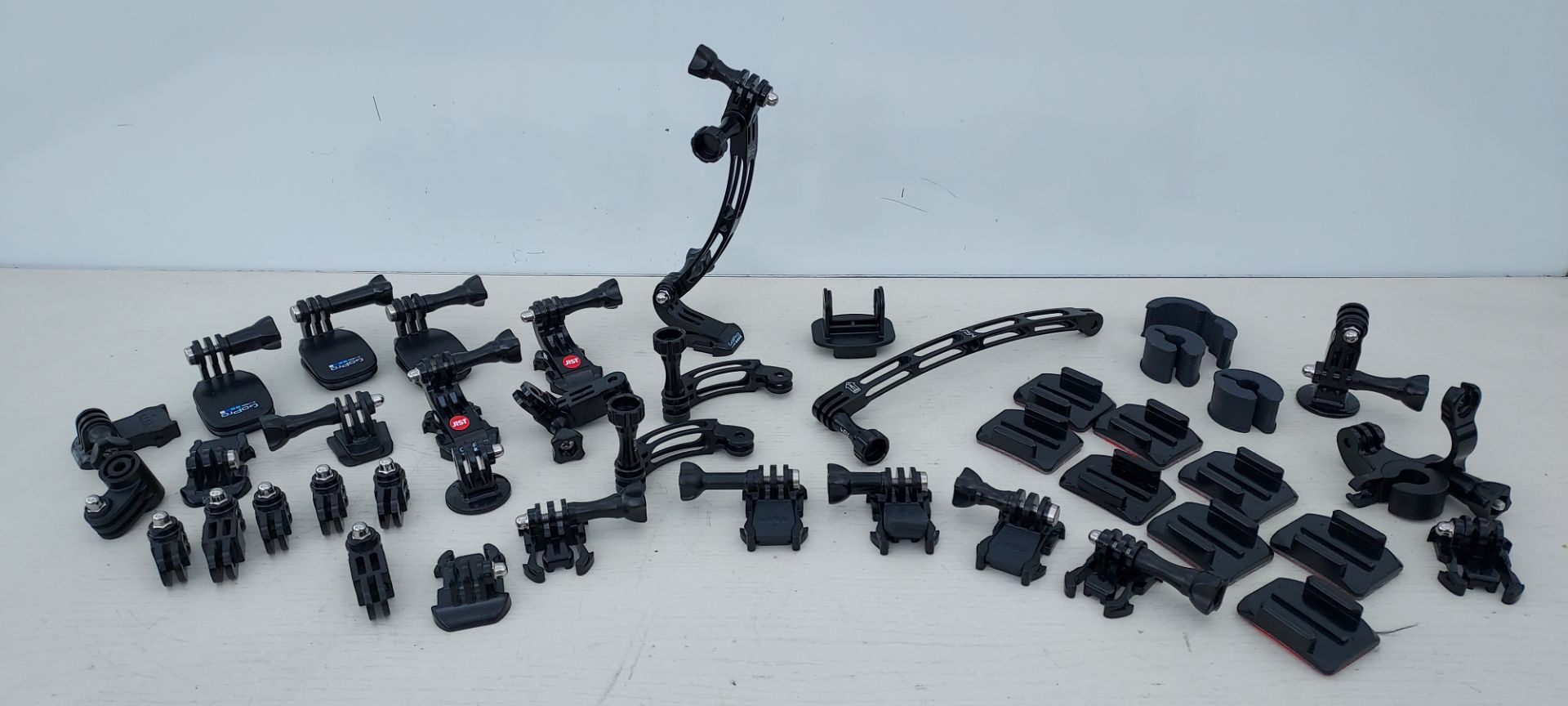 MISC LOT OF 35+ GO PRO MOUNTING ATTACHMENTS FOR CAMERAS & CAMERA MOUNTING PLATES