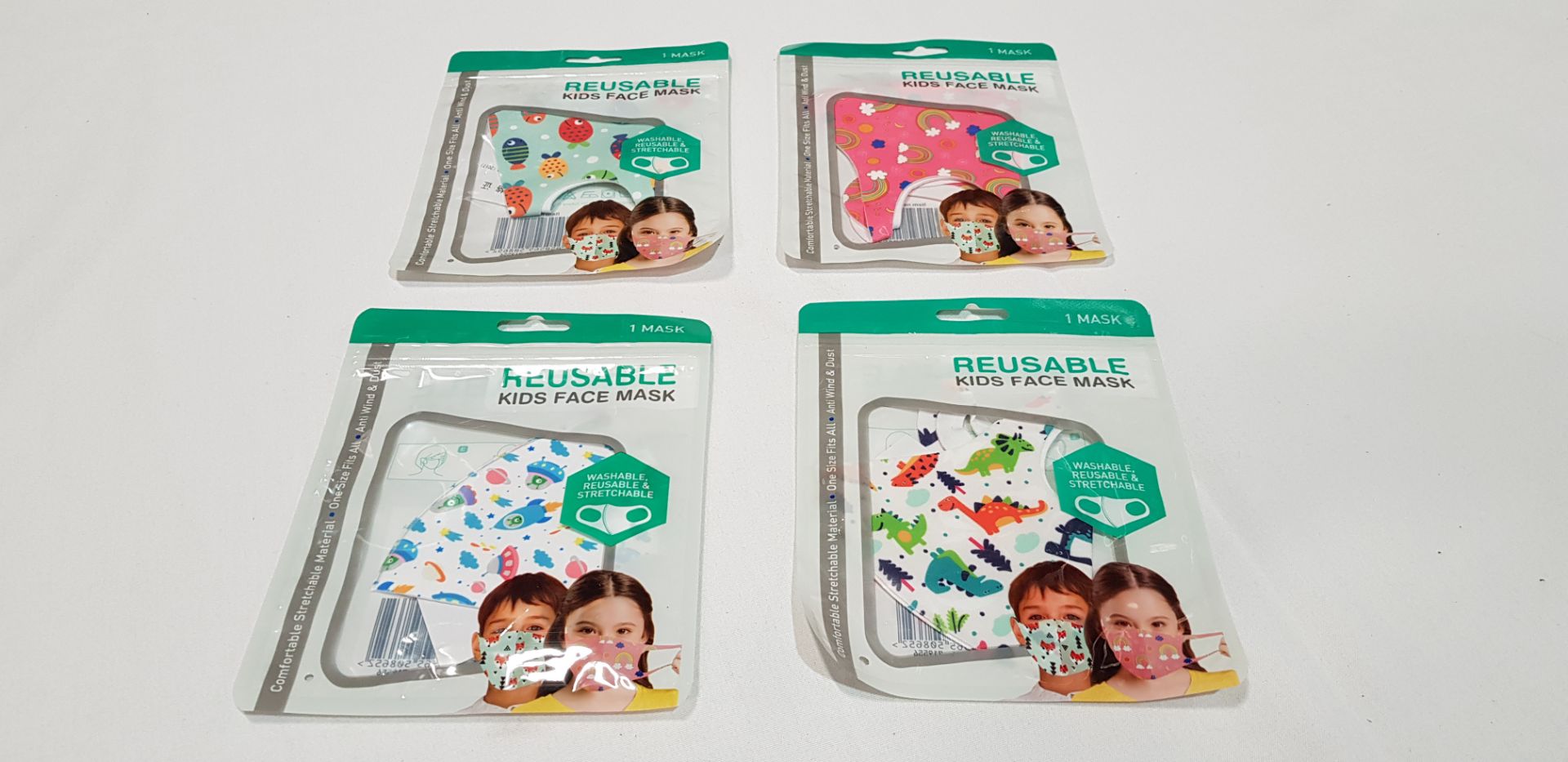 194 X BRAND NEW REUSABLE KIDS FACE MASKS IN VARIOUS DESIGNS SUCH AS RAINBOW, FISH, SPACESHIP STYLES-