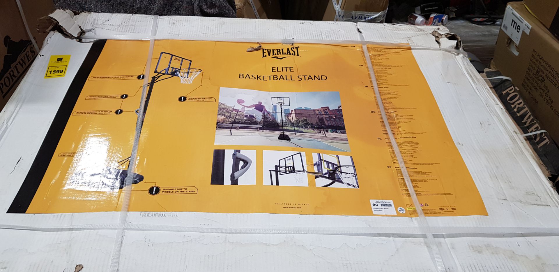 1 X BRAND NEW EVERLAST ELITE BASKETBALL STAND IN BLACK AND YELLOW (NOTE BOX IS SLIGHTLY DAMAGED)