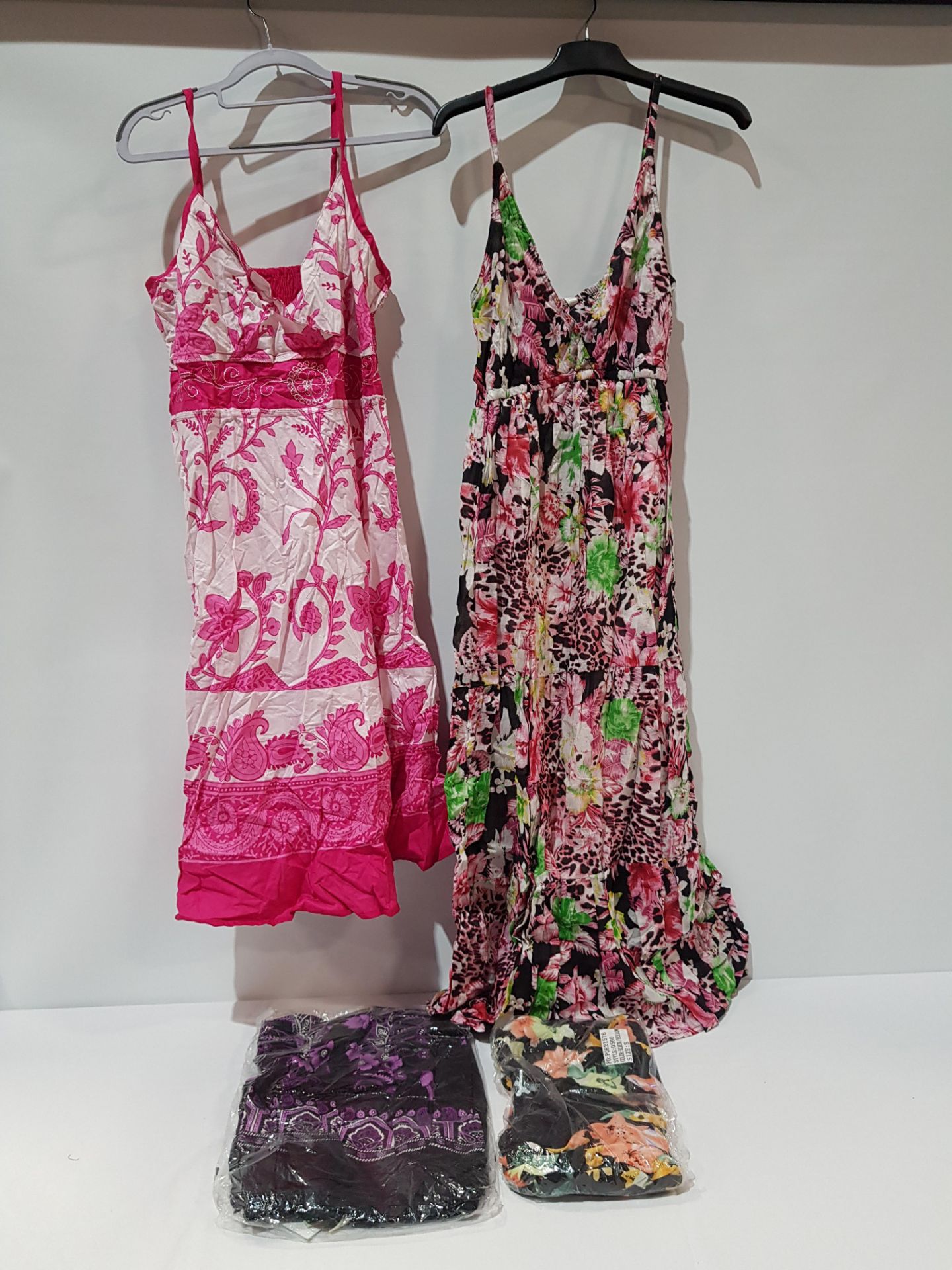 24 X BRAND NEW MIXED STYLE PISTACHIO DRESSES/ SKIRTS IN MIXED DESIGNS AND SIZES( RRP £25 EACH- TOTAL