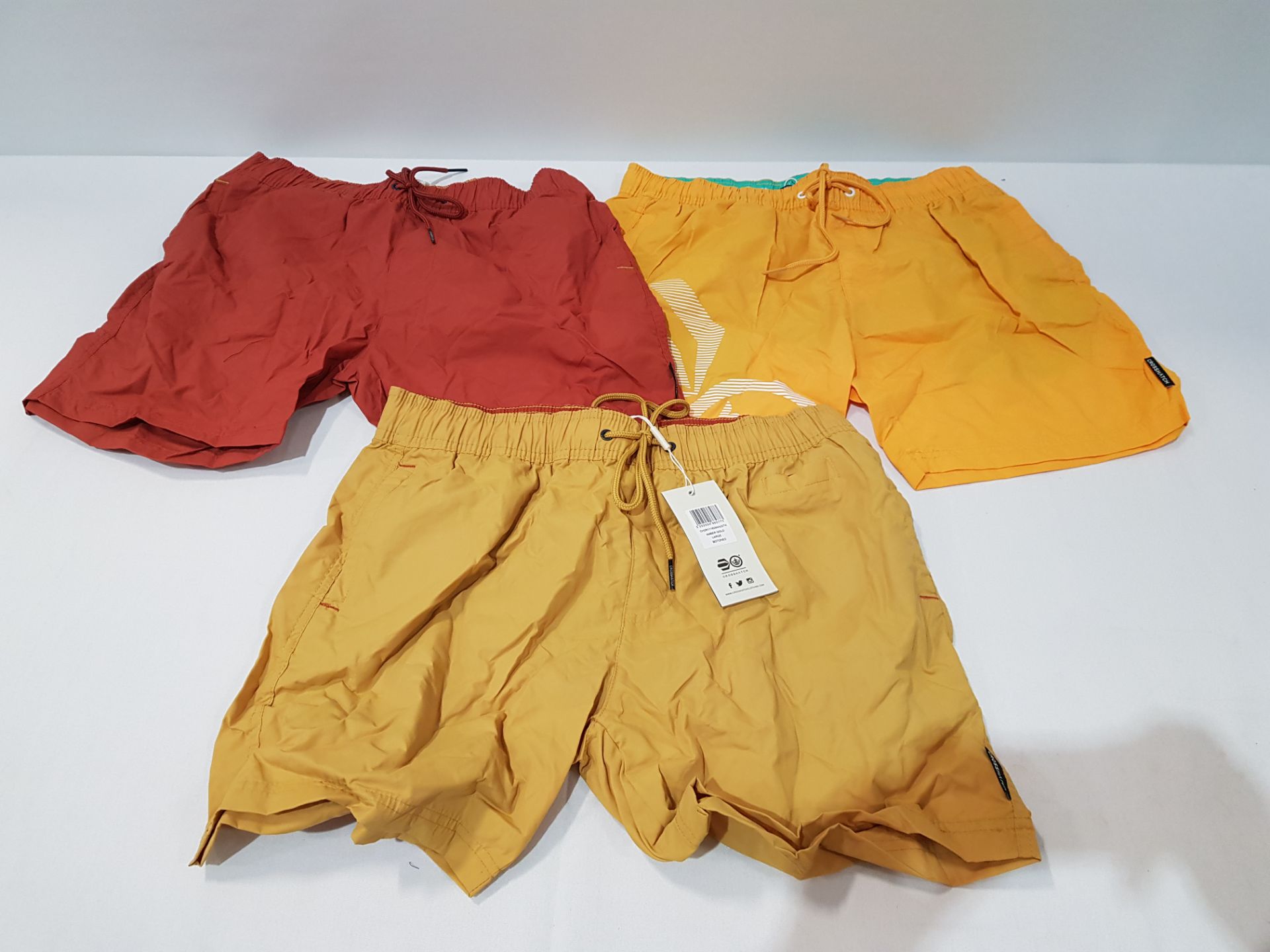 13 X BRAND NEW CROSSHATCH SWIMMING SHORTS IN MIXED COLOURS. THIS INCLUDES AMBER GOLD, BARED RED