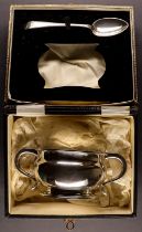 STERLING SILVER SUGAR BOWL AND SPOON. Bowl Sharman D Neill, Belfast  hallmarked 1929 Chester, and