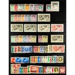 MOROCCO AGENCIES BRITISH CURRENCY 1907 - 1956 collecton of 80+ mint stamps on a protective page,