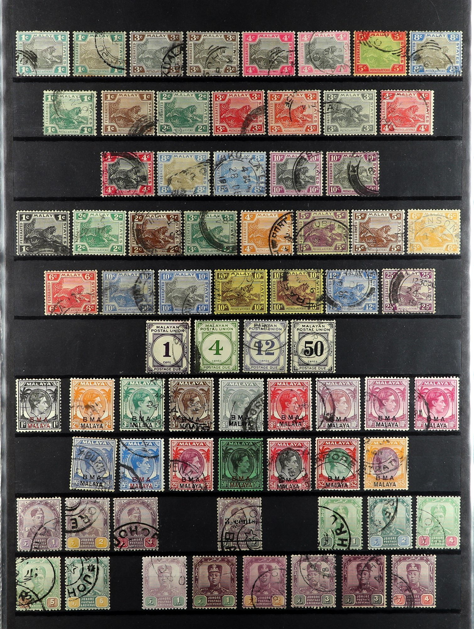 MALAYA STATES 1881-1986 USED COLLECTION of around 900 stamps on protective pages, many higher