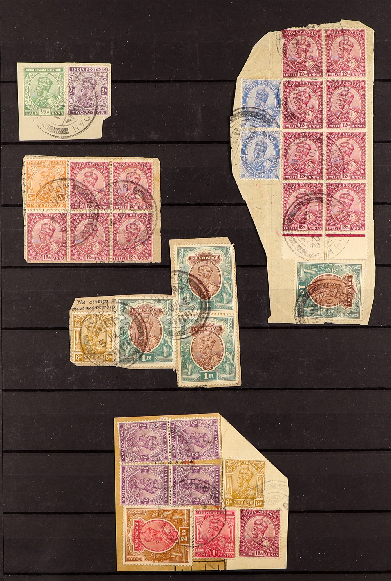 INDIA INDIA USED IN ABADAN (PERSIA) 31 examples of 1920's Indian stamps, tied to pieces by "