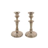 A pair of Edwardian sterling silver candlesticks, Sheffield 1909 by Walter Latham and Son