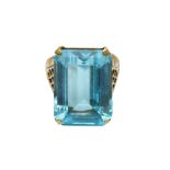 A BLUE TOPAZ DRESS RING